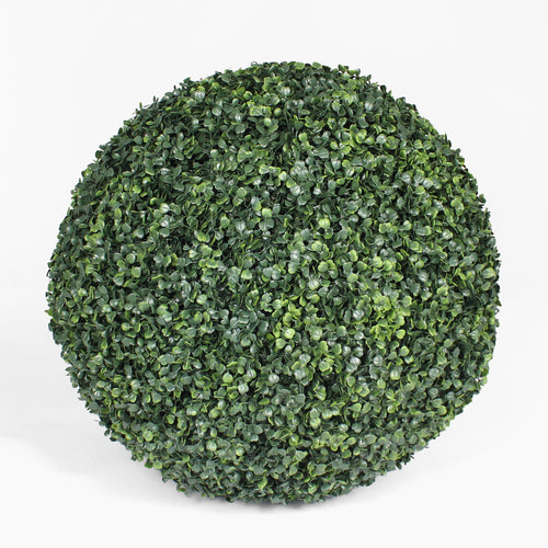 Artificial boxwood ball on a white background