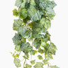 Artificial green leaf garland on a white background