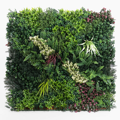 Artificial green wall with various types of greenery on a white background