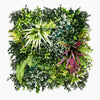 Artificial green wall with various types of plants on a white background