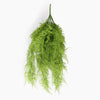 An artificial green fern bush hanging from a single spike, shown against a plain white background.