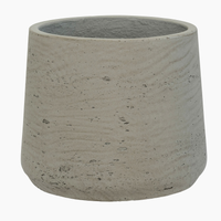 Concrete pot with a textured surface on a white background