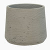 Concrete pot with a textured surface on a white background
