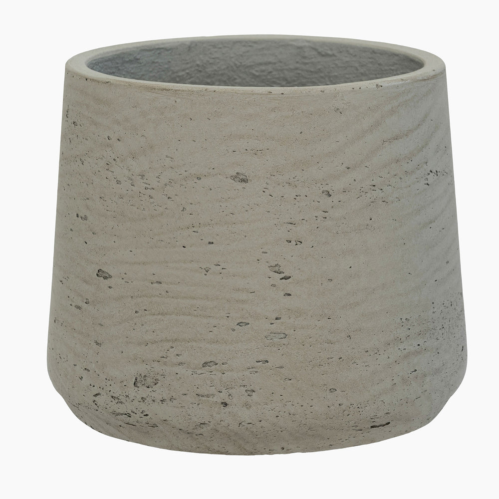 Concrete pot with a textured surface on a white background
