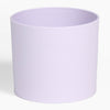 Light purple cylindrical pot on a white background