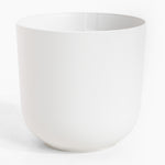 White textured vase on a white background