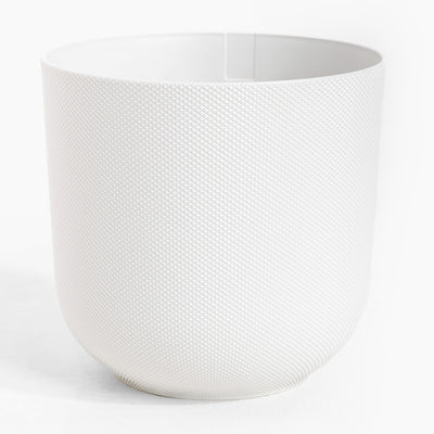 White textured vase on a white background