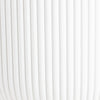 White curtain with vertical pleats on a white background